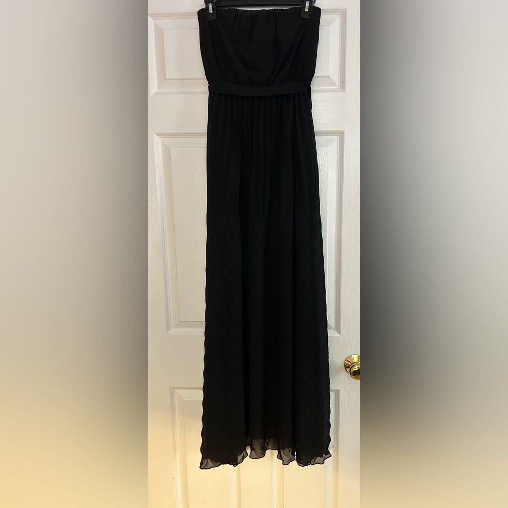 C’isa formal dress with sheer overlay, mid-thigh under lining, chevron design.